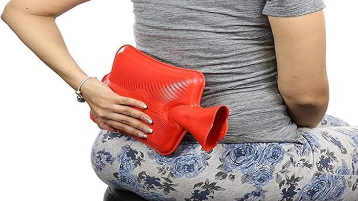 کمپرس آب گرم برای درمان کیست مویی دنبالچه